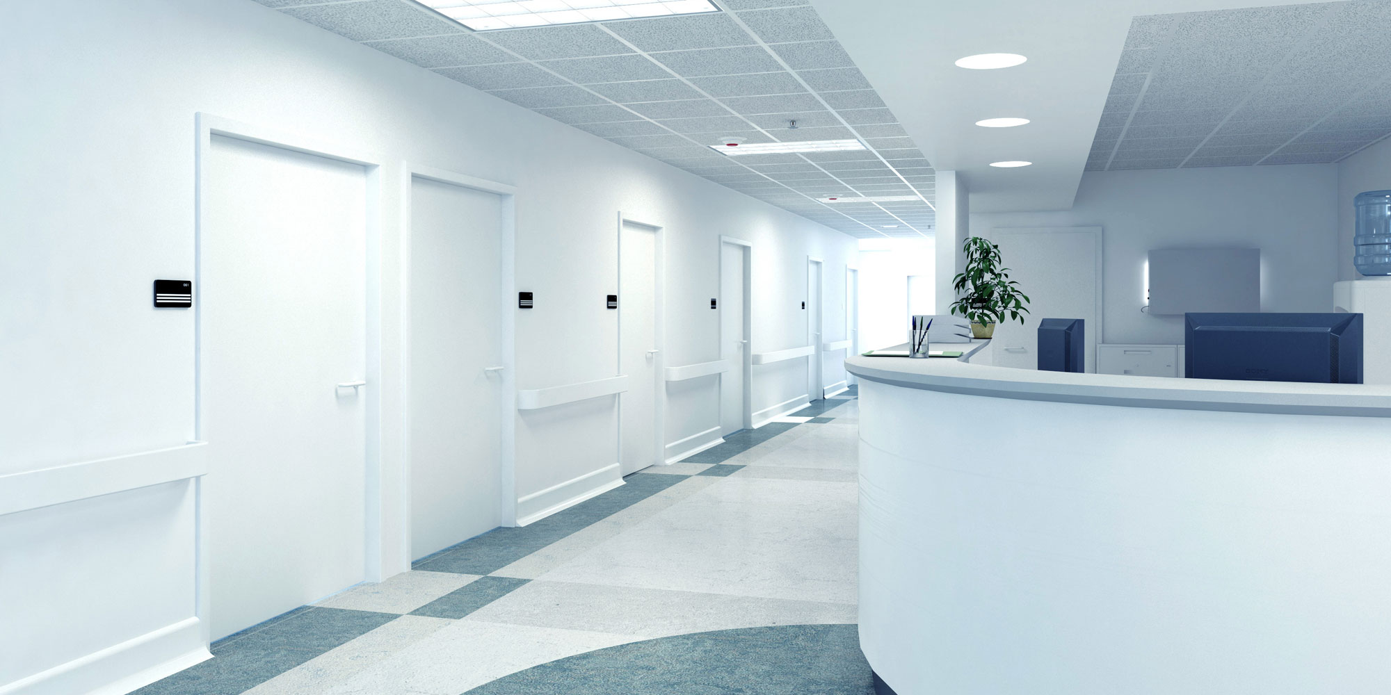 white commercial medical office reception area with geometric floor design
